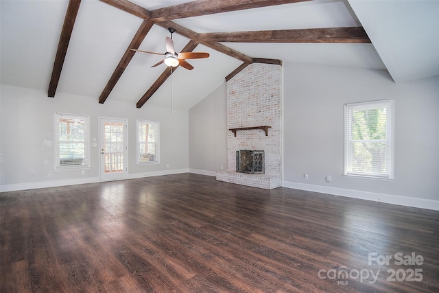 6008 Corkstone Dr, Mint Hill, NC 28227 - unfurnished living room with a ceiling fan, beam ceiling, a fireplace, baseboards, and dark wood finished floors
