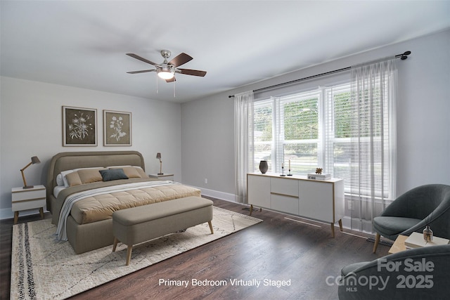 6008 Corkstone Dr, Mint Hill, NC 28227 - bedroom with wood finished floors, baseboards, and a ceiling fan