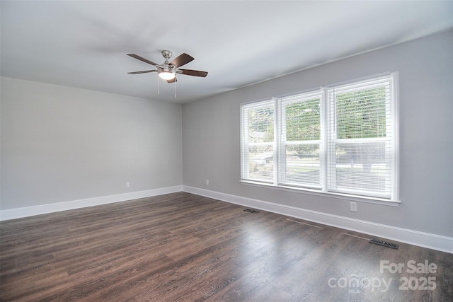 6008 Corkstone Dr, Mint Hill, NC 28227 - unfurnished room with ceiling fan, dark wood-style floors, and baseboards