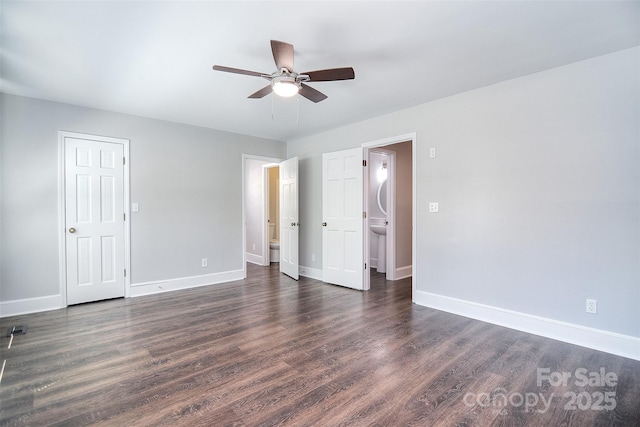 6008 Corkstone Dr, Mint Hill, NC 28227 - unfurnished bedroom featuring baseboards, dark wood-style flooring, and a ceiling fan