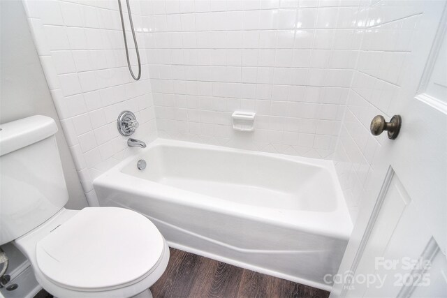 6008 Corkstone Dr, Mint Hill, NC 28227 - full bathroom featuring toilet, shower / tub combination, and wood finished floors