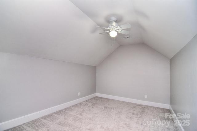6008 Corkstone Dr, Mint Hill, NC 28227 - additional living space featuring ceiling fan, carpet flooring, lofted ceiling, and baseboards