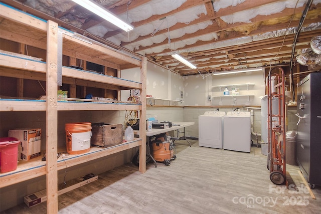 6008 Corkstone Dr, Mint Hill, NC 28227 - unfinished basement with washer and dryer and wood finished floors