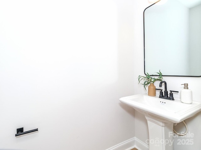 bathroom featuring baseboards