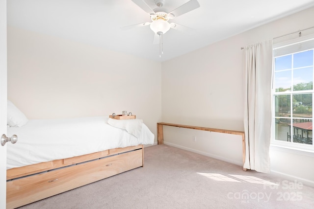 220 Chandeleur Dr, Mooresville, NC 28117 - unfurnished bedroom with carpet flooring, baseboards, and a ceiling fan