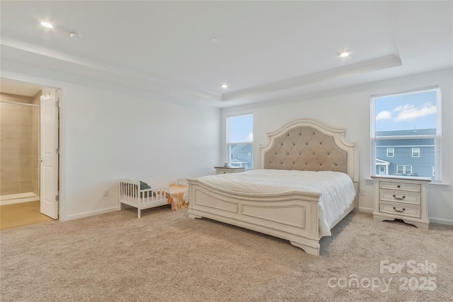 14224 Canemeadow Dr, Charlotte, NC 28278 - bedroom featuring a tray ceiling, light carpet, baseboards, recessed lighting, and ensuite bath
