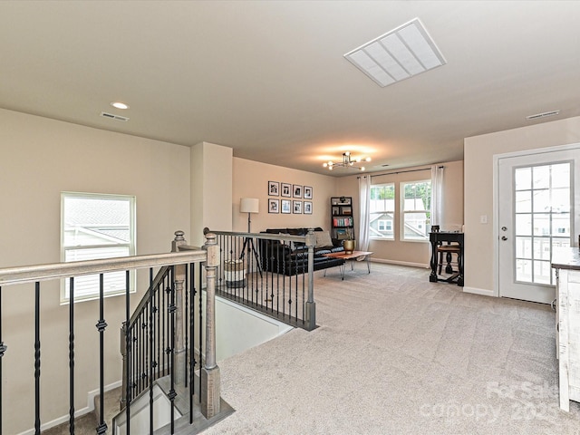10035 Mast Cove Ln, Charlotte, NC 28278 - hallway with an upstairs landing, carpet, and baseboards