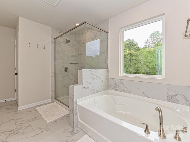 10035 Mast Cove Ln, Charlotte, NC 28278 - full bathroom featuring a bath, a stall shower, and marble finish flooring
