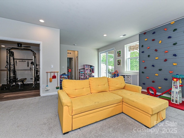 10035 Mast Cove Ln, Charlotte, NC 28278 - carpeted living area with recessed lighting and baseboards