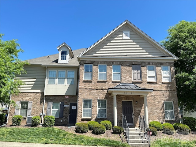 12421 Fiorentina St, Charlotte, NC 28277 - view of front of property featuring brick siding and a front lawn