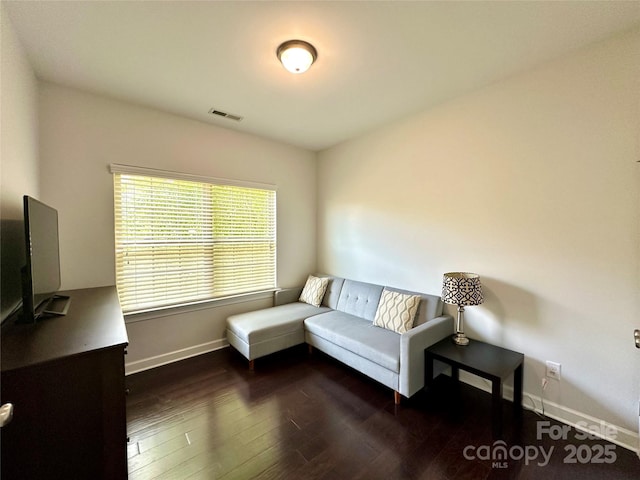 12421 Fiorentina St, Charlotte, NC 28277 - living area featuring wood finished floors, baseboards, and visible vents