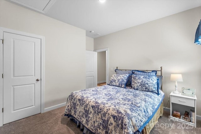bedroom featuring baseboards and carpet flooring