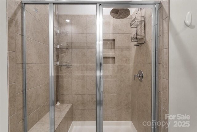 bathroom with a stall shower