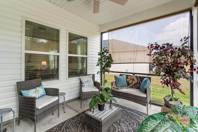 sunroom / solarium with outdoor lounge area and a ceiling fan