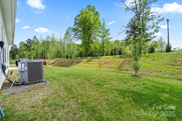 view of yard with central AC