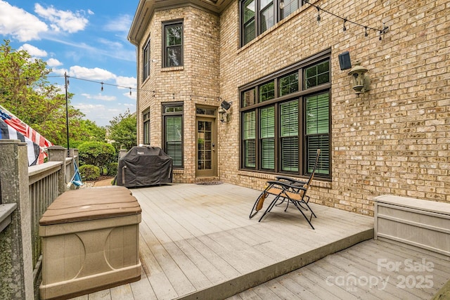 deck featuring grilling area