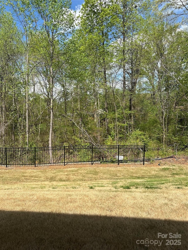 2932 Pirates Pl, Charlotte, NC 28216 - view of yard with a wooded view