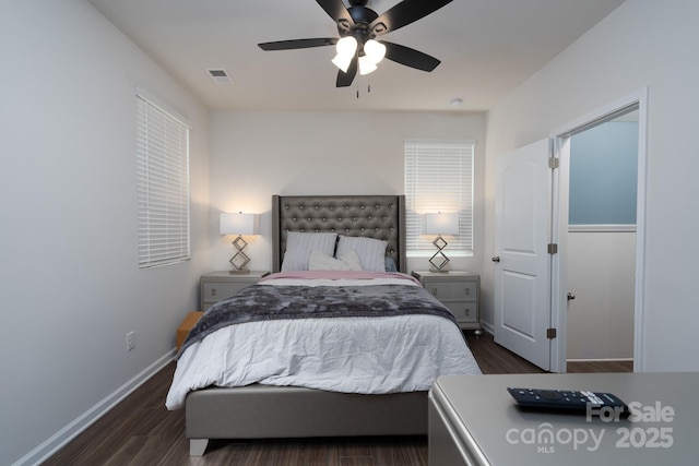 2932 Pirates Pl, Charlotte, NC 28216 - bedroom featuring dark wood finished floors, baseboards, and a ceiling fan