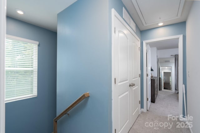 2932 Pirates Pl, Charlotte, NC 28216 - hallway with attic access, an upstairs landing, light colored carpet, and recessed lighting