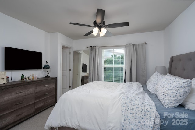 2932 Pirates Pl, Charlotte, NC 28216 - carpeted bedroom featuring a ceiling fan