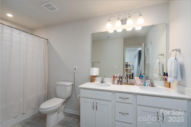 2932 Pirates Pl, Charlotte, NC 28216 - bathroom with toilet, tile patterned floors, double vanity, shower / tub combo with curtain, and recessed lighting