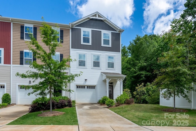 2932 Pirates Pl, Charlotte, NC 28216 - multi unit property featuring an attached garage, driveway, and a front yard