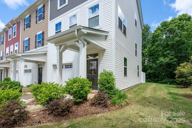 2932 Pirates Pl, Charlotte, NC 28216 - view of front of home featuring a front lawn and an attached garage