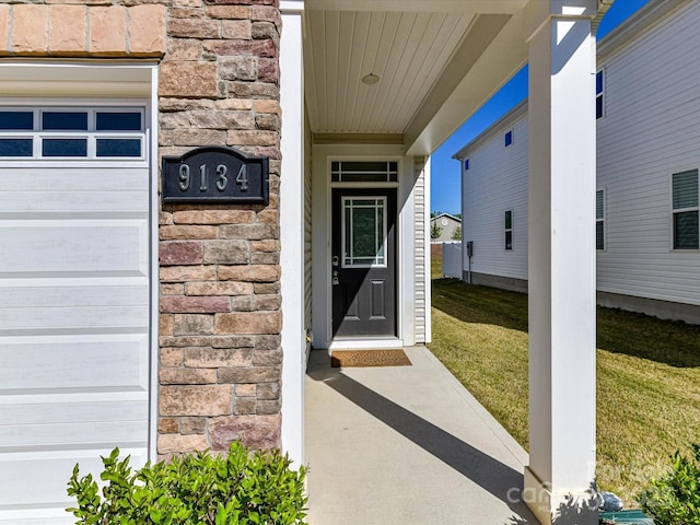 9134 Northfield Crossing Dr, Charlotte, NC 28269 - view of exterior entry with a yard and stone siding