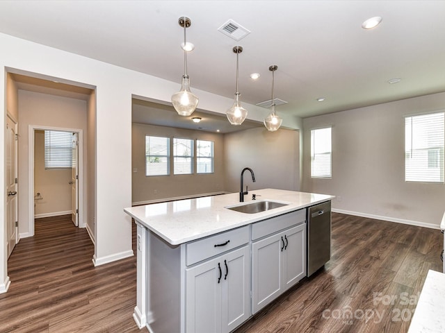 9134 Northfield Crossing Dr, Charlotte, NC 28269 - kitchen featuring hanging light fixtures, a sink, baseboards, stainless steel dishwasher, and dark wood-style floors