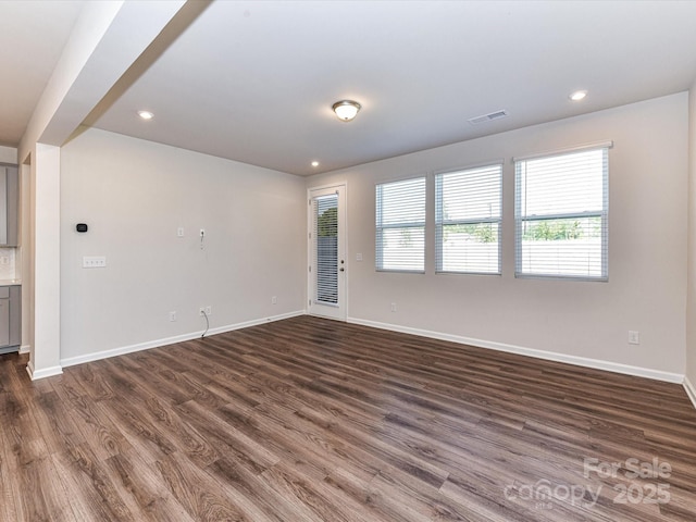 9134 Northfield Crossing Dr, Charlotte, NC 28269 - unfurnished living room featuring recessed lighting, baseboards, visible vents, and dark wood-type flooring