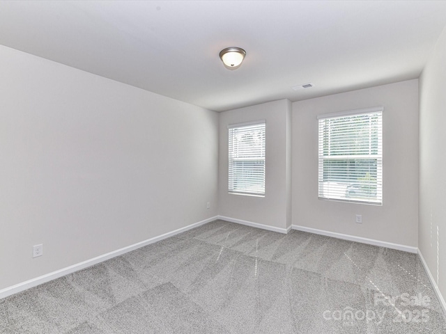 9134 Northfield Crossing Dr, Charlotte, NC 28269 - carpeted spare room featuring baseboards and visible vents