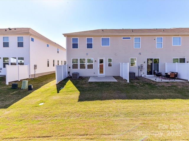 9134 Northfield Crossing Dr, Charlotte, NC 28269 - back of house with fence, central air condition unit, a yard, and a patio area