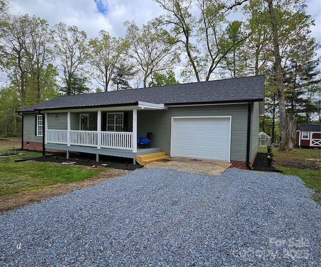 118 Knight Ln, Lawndale, NC 28090 - single story home with a shingled roof, an attached garage, covered porch, crawl space, and gravel driveway