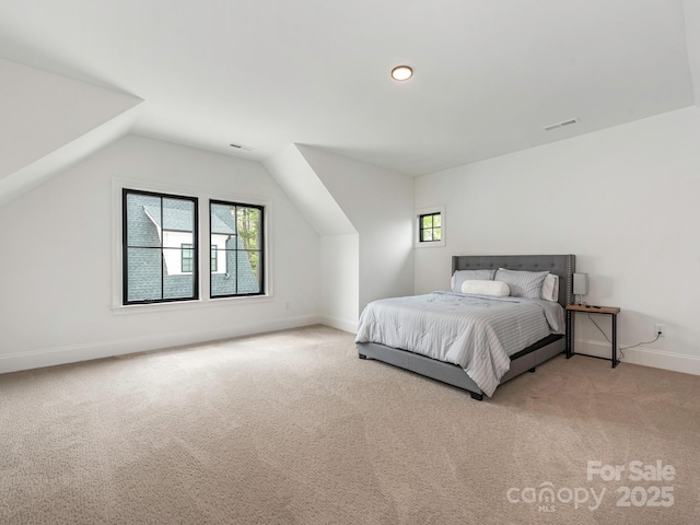 bedroom featuring visible vents, vaulted ceiling, recessed lighting, carpet flooring, and baseboards
