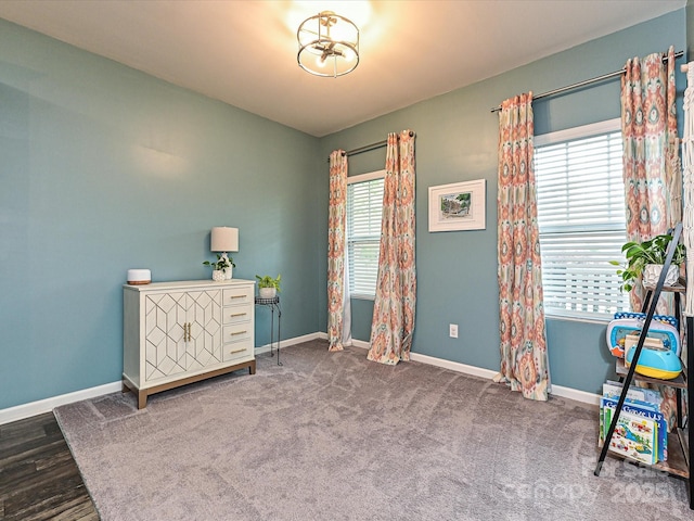 sitting room featuring baseboards