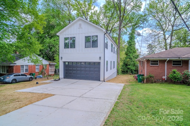 1413 Hateras Ave, Charlotte, NC 28216 - view of front of property featuring concrete driveway, a front yard, board and batten siding, and a garage