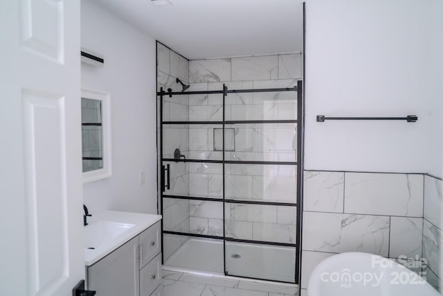 1413 Hateras Ave, Charlotte, NC 28216 - bathroom with vanity, a shower stall, and marble finish floor