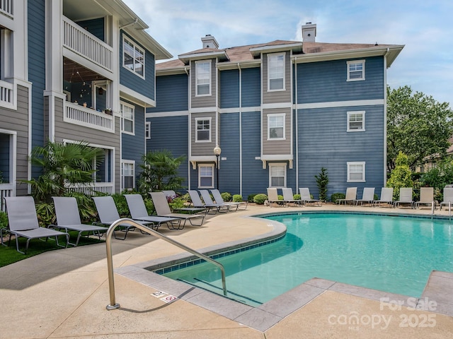 pool with a patio