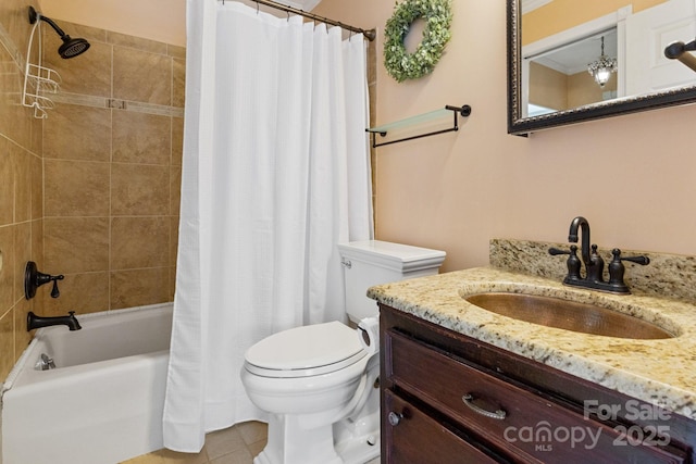 full bath featuring shower / tub combo, toilet, vanity, and tile patterned floors