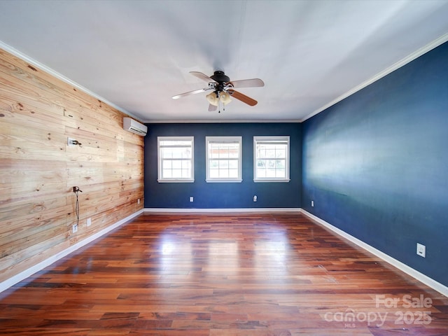 3530 Farm Lake Dr SW, Concord, NC 28027 - unfurnished room featuring a wall unit AC, ornamental molding, a ceiling fan, wood finished floors, and baseboards