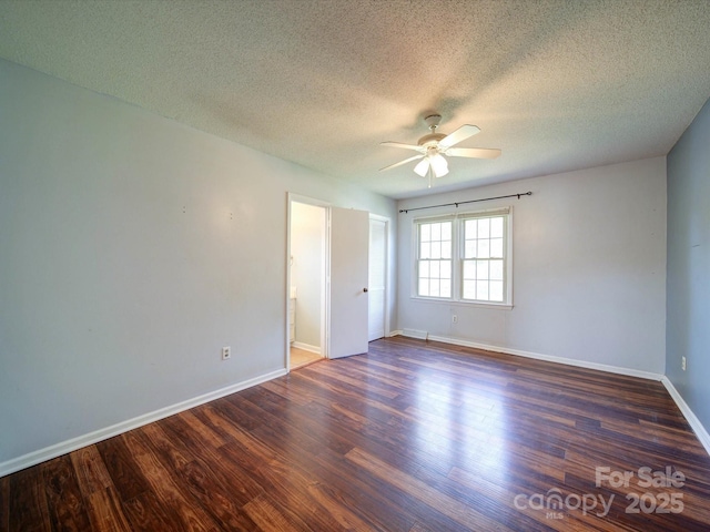 3530 Farm Lake Dr SW, Concord, NC 28027 - unfurnished bedroom with ceiling fan, a textured ceiling, baseboards, and wood finished floors