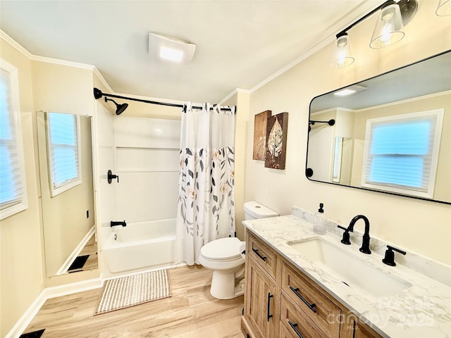 full bathroom featuring vanity, ornamental molding, toilet, shower / bathtub combination with curtain, and wood finished floors