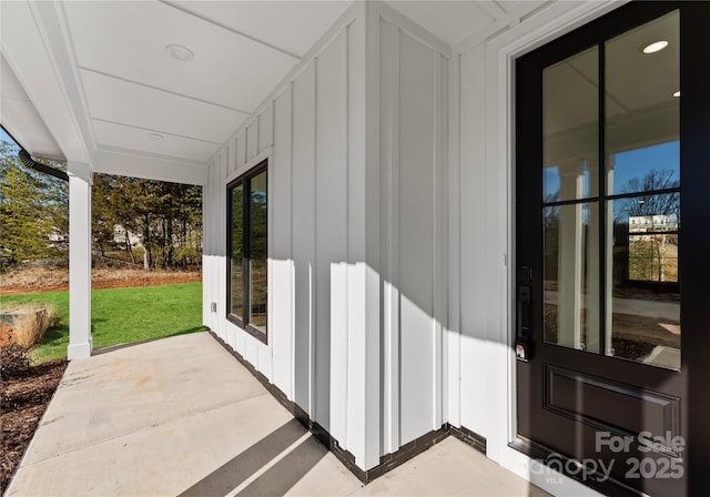 13453 Portside Ln, Lancaster, SC 29720 - property entrance with a lawn and board and batten siding