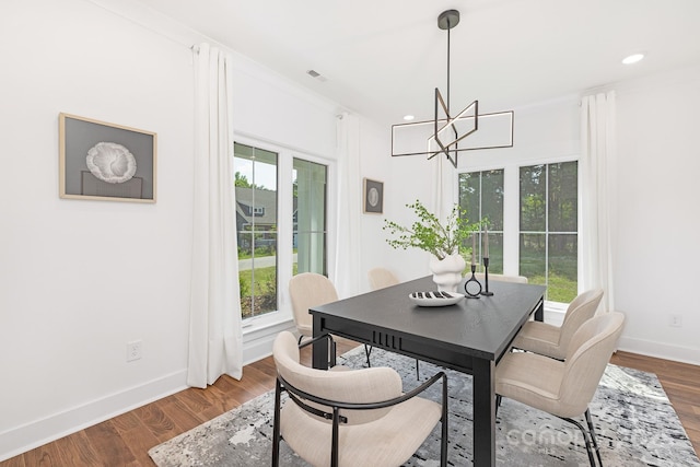 13453 Portside Ln, Lancaster, SC 29720 - dining room with baseboards, visible vents, dark wood finished floors, and a notable chandelier