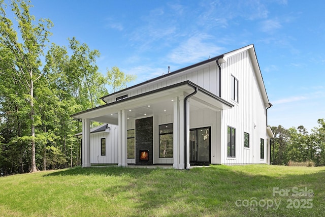 13453 Portside Ln, Lancaster, SC 29720 - back of property featuring a lawn and board and batten siding