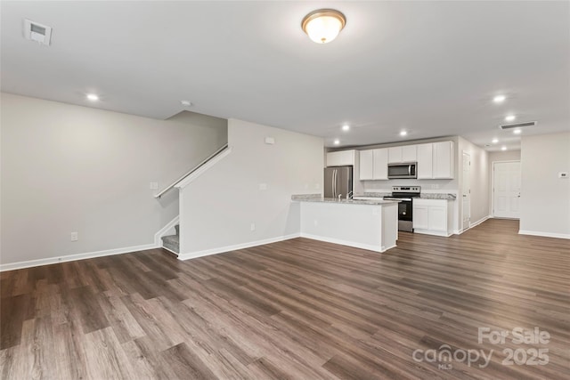 221 Century Dr, Salisbury, NC 28147 - kitchen with stainless steel appliances, open floor plan, and visible vents