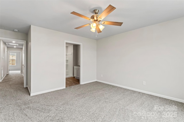 221 Century Dr, Salisbury, NC 28147 - unfurnished bedroom featuring ceiling fan, baseboards, carpet, and ensuite bath