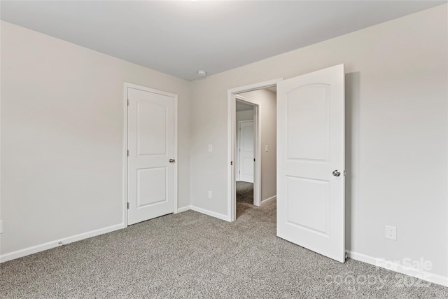 221 Century Dr, Salisbury, NC 28147 - unfurnished bedroom with light colored carpet and baseboards