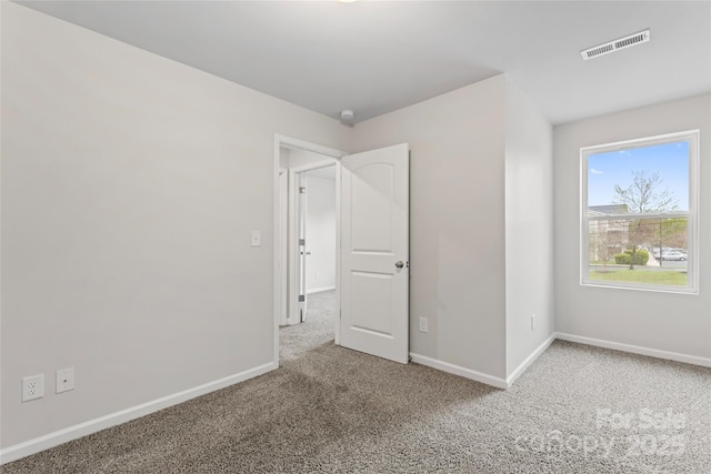221 Century Dr, Salisbury, NC 28147 - unfurnished bedroom with visible vents, baseboards, and carpet floors