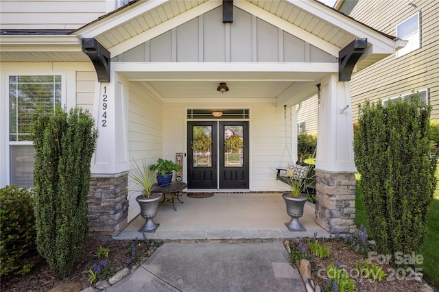 12942 Blakemore Ave, Huntersville, NC 28078 - doorway to property with a porch, board and batten siding, and french doors